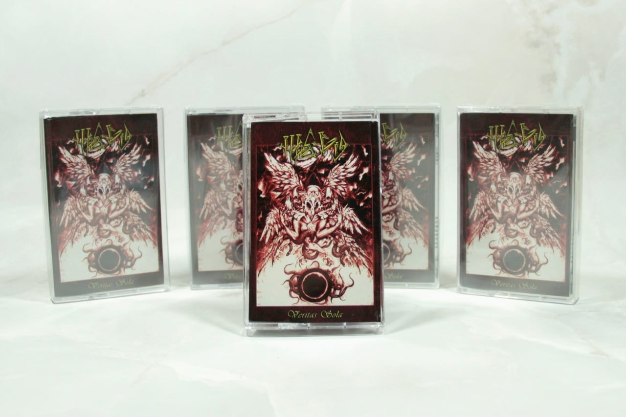 MES-GIG - Veritas Sola (2025) Thrash Death Metal / Россия / Аудиокассета — фото товара